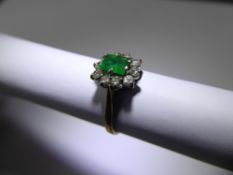 An Antique 18 ct (tested) Yellow Gold Emerald and Diamond Ring. Emerald 5.5 x 4.2 mm, approx 25