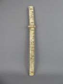 A Circa 1900 Japanese Short Sword, scabbard carved with warrior figures, approx 45 cms.