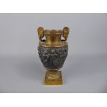 A Gilt Bronze Vase, a banded frieze depicting classical scenes in relief, approx 16 cms.