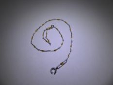 A Fine Platinum and Yellow Gold Ankle Chain, approx 23 cms, approx 1.8 gms