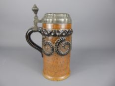 An Antique German Salt-Glazed Covered 1 Lt Tankard decorated with black swirls, marks to base 'R