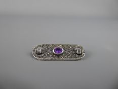 An Art Nouveau Silver Marcasite and Amethyst Brooch, silver import marks, amethyst 7 x 5 mm,