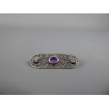 An Art Nouveau Silver Marcasite and Amethyst Brooch, silver import marks, amethyst 7 x 5 mm,