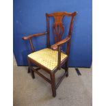 A Chippendale Style Oak Arm Chair with lyre back, fabric seat, straight legs and stretchers.