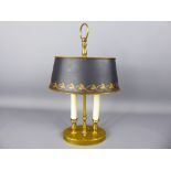A Vintage Brass Bedside Light, with black/gold shade, approx 28 cms high.