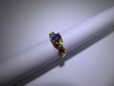 An 18 ct Yellow Gold Diamond and Sapphire Ring,