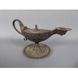 Circa 1840 E.G Zimmermann of Hanau Cast Iron Chamberstick, in the form of an antique oil lamp, nr