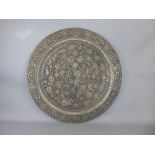 An Antique Middle Eastern Copper Charger, approx 67 cms diameter.