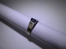 An 18ct White Gold and Sapphire Ring, mm AHB, size O, approx 3.3 gms.