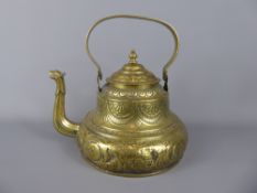 A 19th Century Dutch Kettle, the brass kettle having a snake head spout with coat of arms to side.