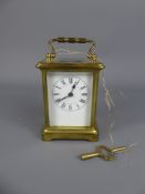 A Brass Carriage Clock, white enamel face with Roman dial, S F movement, approx 8 x 6 x 10 cms.