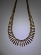 A Lady's 9 ct Gold Graduated Cleopatra Necklace, approx 42 cms, approx 19 gms.