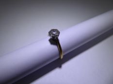 An 18 ct Yellow Gold and Platinum Solitaire Diamond Ring, approx 60 pts, size G, approx 1.9 gms.