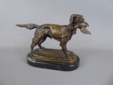 A Bronze Retriever with a Duck in its mouth, on marble plinth, approx 25 x 15 cms.