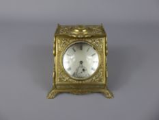 A Silver Gentleman's Pocket Watch, contained within a brass magnifying travelling stand, stamped