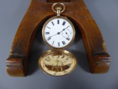 A Gentleman's 14 ct Gold Full Hunter Pocket Watch, having a white enamel face with minute dial,
