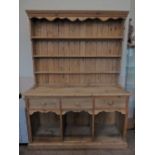 A Vintage Pine Dresser with three plate shelves to top and three drawers to bottom above three