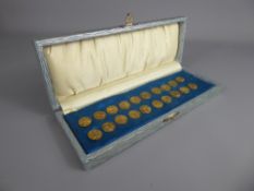 A Set of Twenty Two Vintage Continental Brass Buttons, in the original box.