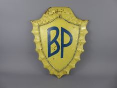 A Vintage Metal 'BP' Advertising Shield, blue letters on a yellow background, approx 14 x 44 cms.