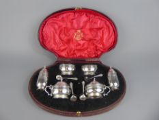 A Silver Double Cruet Set, comprising pair of salts, pair of mustards, pair of peppers and four