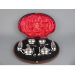 A Silver Double Cruet Set, comprising pair of salts, pair of mustards, pair of peppers and four