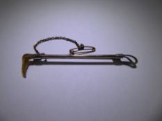 A 9 ct Yellow and White Gold Hunting Crop Stick Pin, mm J.G. & S, approx 3 gms.