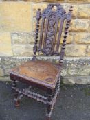 An Antique Oak Hall Chair, with barley twist frame and turned stretchers.