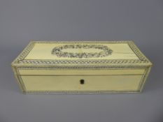 An Antique Ivory Box, the box having decorative foliate inlay to the lid, approx 26 x 10 x 8 cms.