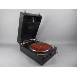 A Vintage Record Player marked 'Columbia Gramophone Co London EC1', in a black case, approx 28.5 x