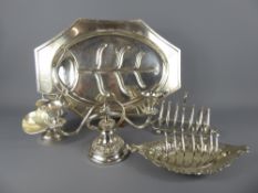 A Large Box of Silver Plate, including candelabra, cruet sets, flat wear, meat plate etc.