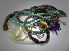 A Collection of Hard Stone Necklaces, including Amethyst, Agate, Turquoise amongst it, together with