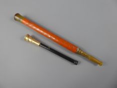 An Alfred Dunhill 9 ct Gold Cigarette Holder together with a 1920's extending cigarette holder (