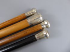 Four Silver Topped Walking Canes, including one made of bamboo. (4)