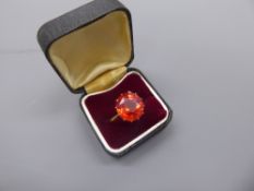 An Antique 18ct Rose Gold Red Stone Ring. The ring having great lustre, size K (with ring sizes),