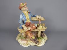 A Capodimonte figurine, mark beneath, approx 27 x 30 cms.