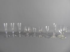 A Selection of Nine Early and Late Georgian Glasses, including one rummer, a claret glass, four