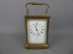 A Brass Carriage Clock, the enamelled dial marked J A Haskell, Ipswich, with blue hands and Roman