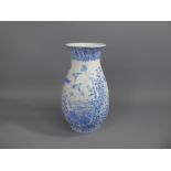 A Late 19th Century Japanese Blue & White Baluster Vase, hand painted with flowers and birds,