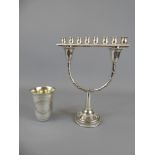 An Israeli Silver Menorah stamped 925, approx 94.8 gms., together with a silver beaker, approx 25.