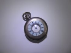 An Antique Silver and Enamel 1/2 Hunter Pocket Watch.