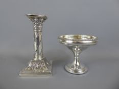 A Silver Candle Stick, London hallmark dated 1925, mm SS Ltd, together with a bon bon dish