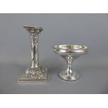 A Silver Candle Stick, London hallmark dated 1925, mm SS Ltd, together with a bon bon dish