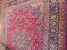 A Large 20th Century Persian Wool Carpet, jewel colours of foliate design, approx 317 x 250 cms. (