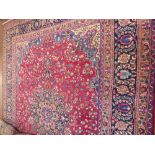 A Large 20th Century Persian Wool Carpet, jewel colours of foliate design, approx 317 x 250 cms. (