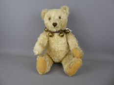 A Circa 1950 Steiff White Bear, with button to the right ear, this Steiff bear features a swivel