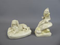 A Mid-20th Century Belleek Figurine, depicting a resting dog, bearing the back stamp for period