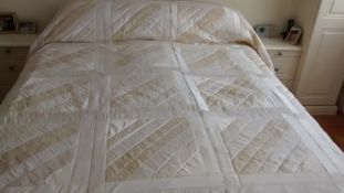 An Indian Cream Silk Super King Size Bed Cover, together with matching pillow cases.