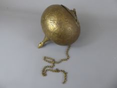 A 19th Century Persian Kajars Hanging Spherical Spice Container. The container engraved with figural