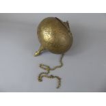 A 19th Century Persian Kajars Hanging Spherical Spice Container. The container engraved with figural