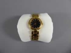 A Lady's 18k Gold Plated Raymond Wiel Wrist Watch, the watch having a black and white stone face,